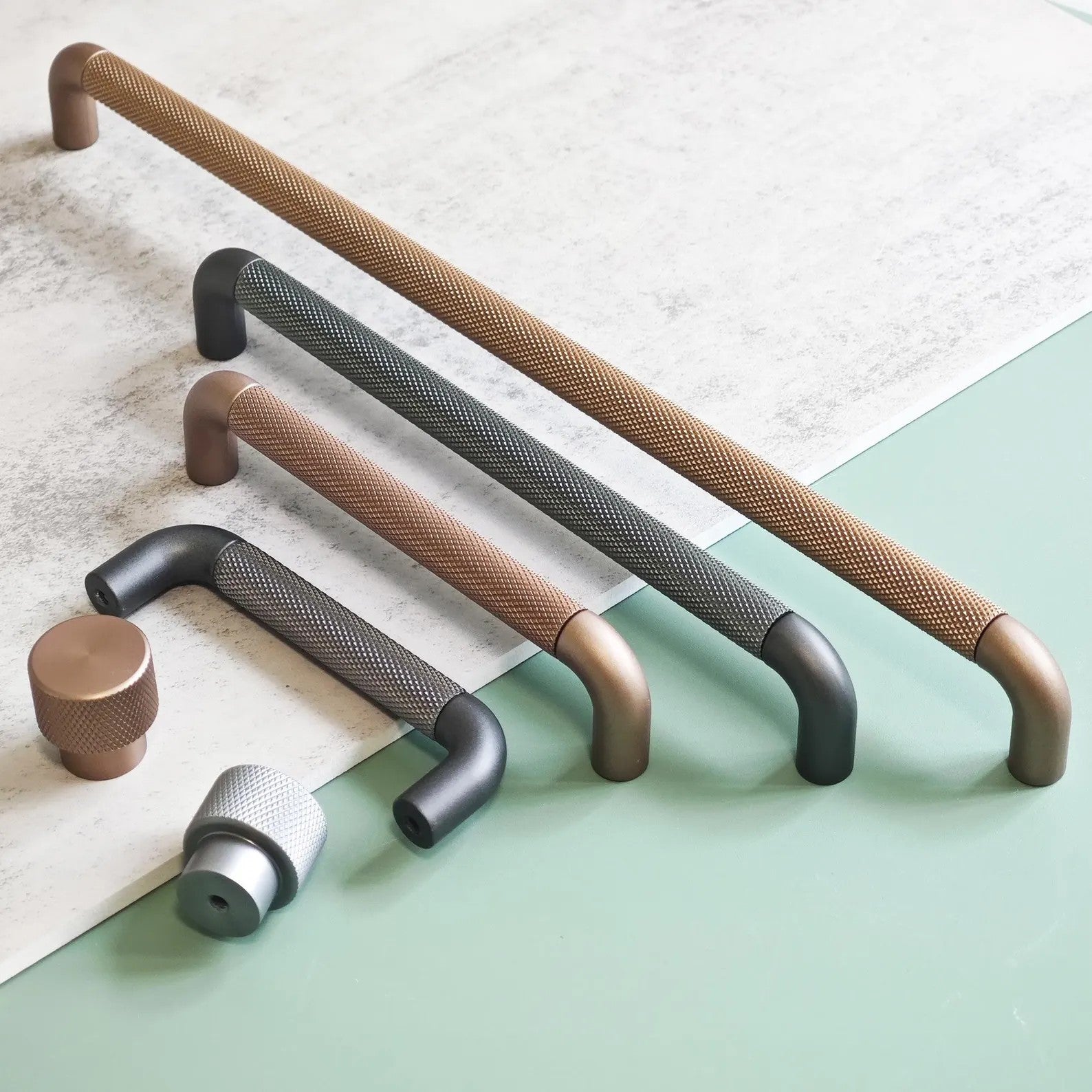Brass Essence textured zinc alloy bar and knob handle set with modern industrial design, featuring sleek, durable hardware.
