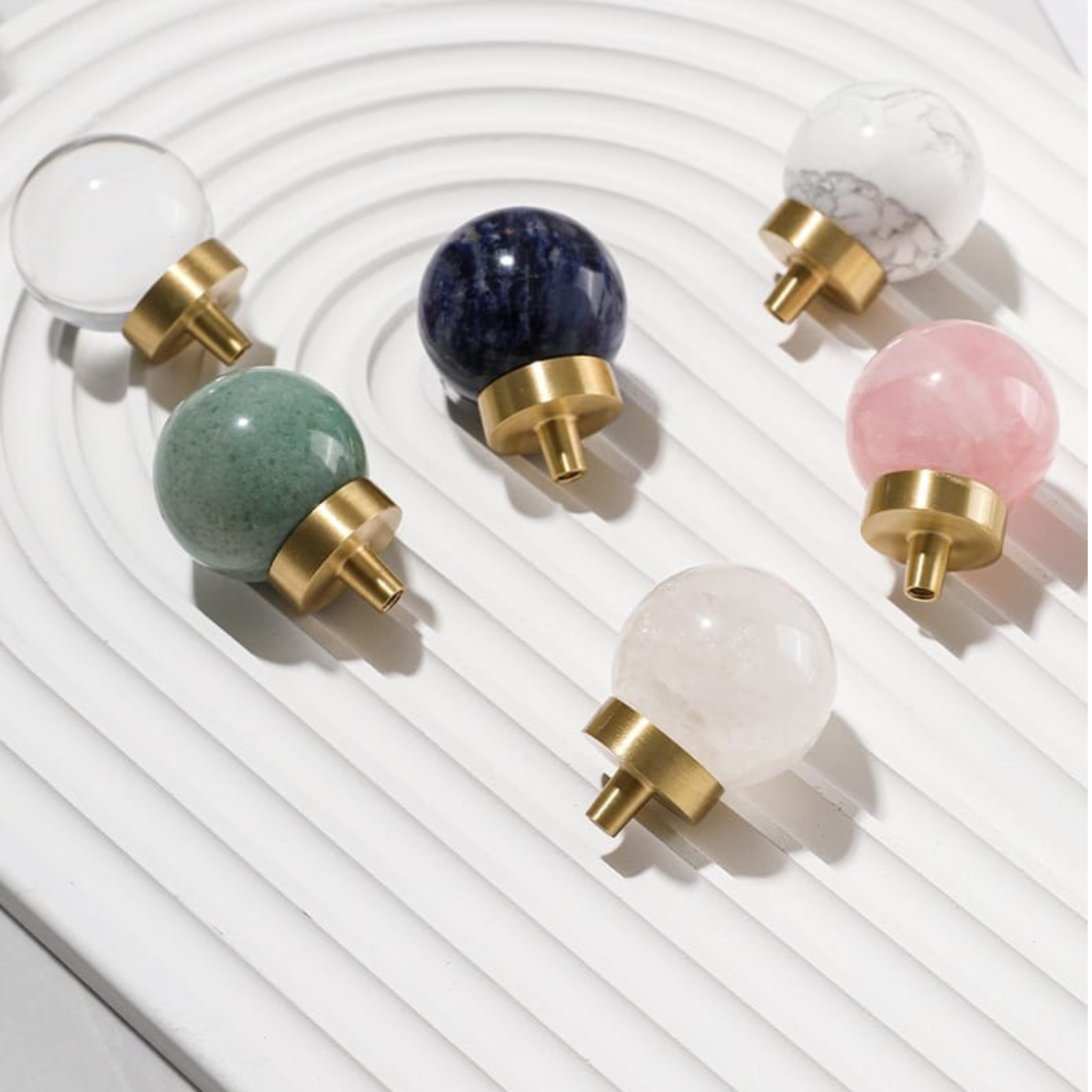 Brass essence natural crystal ball and brass cabinet knob, showcasing a polished crystal sphere and antique brass finish knob.