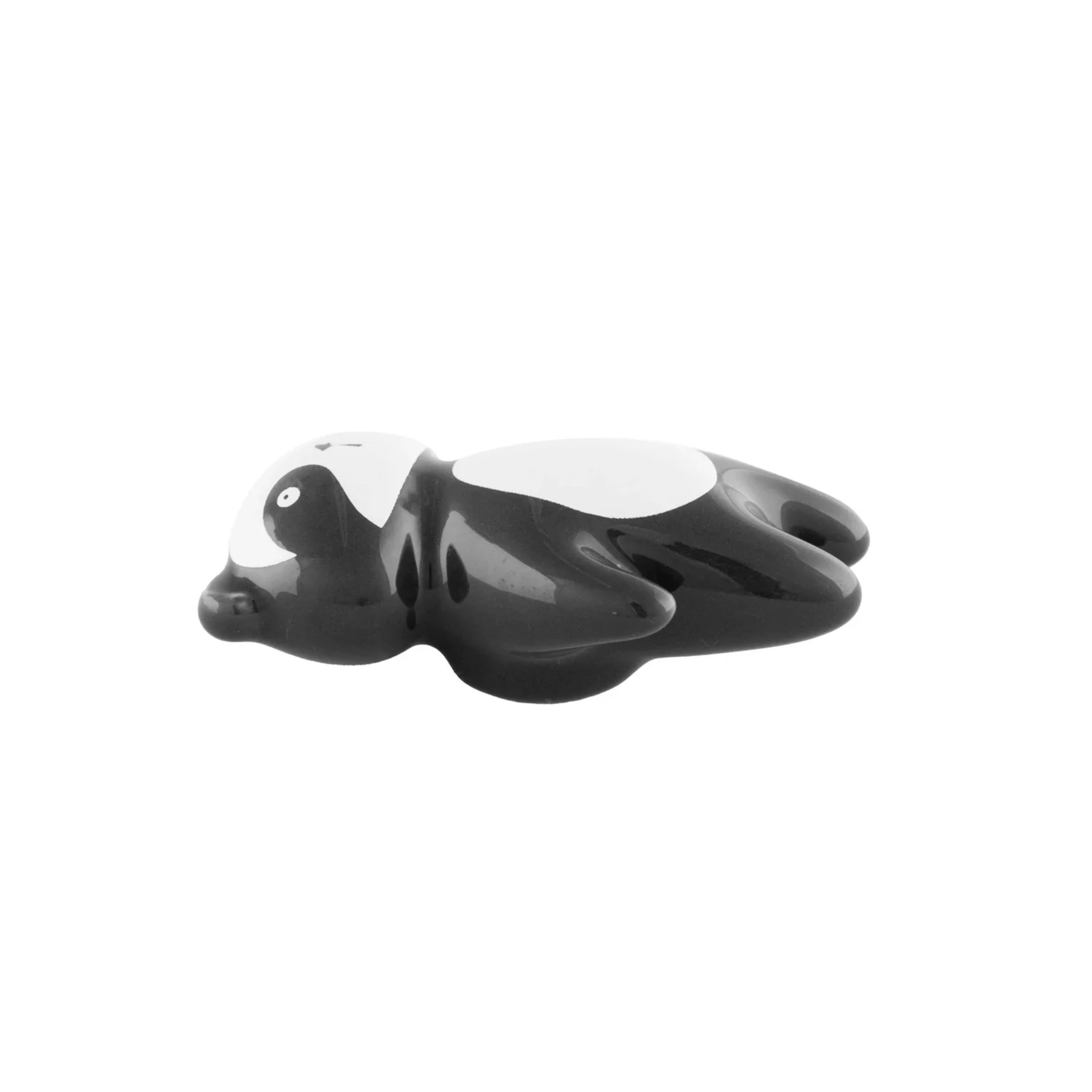 Ceramic animal cabinet pull from Brass Essence collection, featuring a detailed animal design on a smooth ceramic handle.