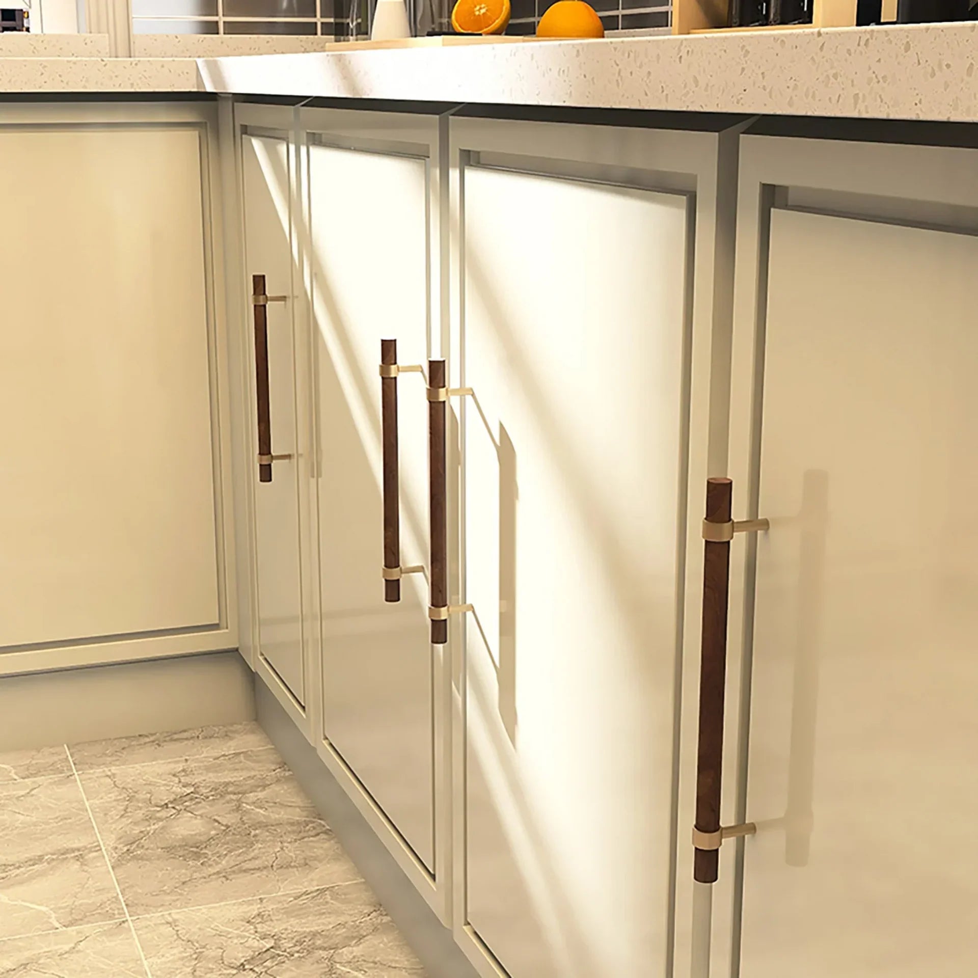 Brass Essence Walnut & Brass T-Bar Handle Collection, featuring sleek wooden and brass T-bar handles on a white background