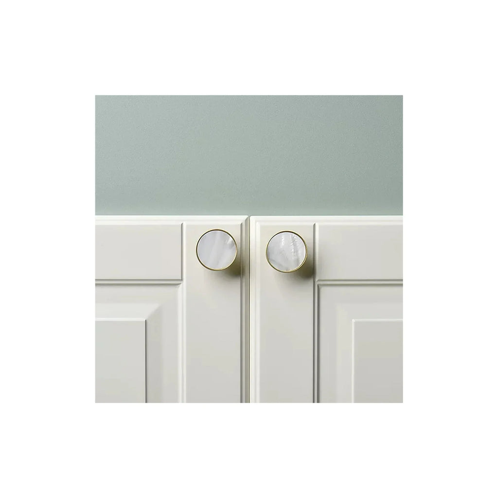 Mother of Pearl and brass round cabinet knob by Brass Essence, showcasing a polished, elegant decorative hardware piece.