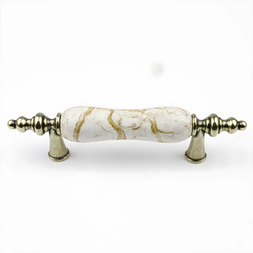 Antique ceramic and zinc cabinet pulls by Brass Essence, featuring detailed ceramic handles with zinc backing, perfect for vintage furniture.