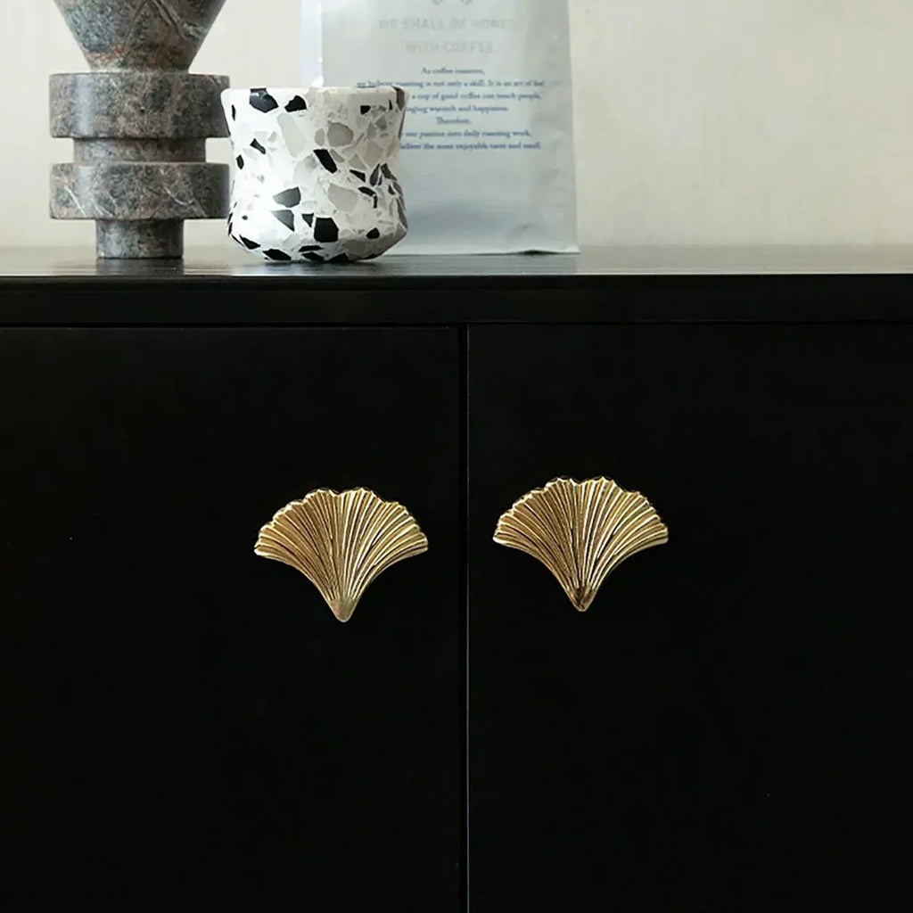 Glossy gold Ginkgo leaf solid brass cabinet knobs in 50 mm and 65 mm by Brass Essence