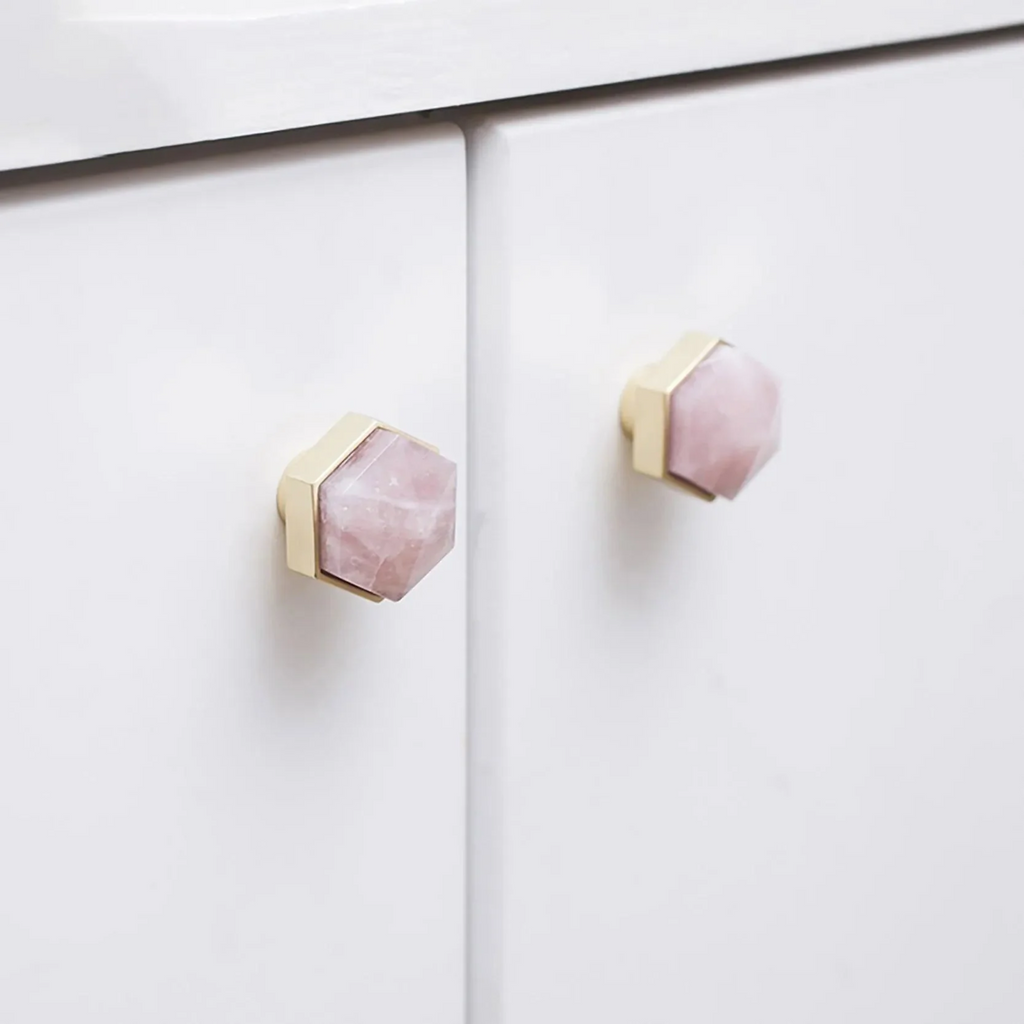 Brass Essence natural crystal and brass hexagon knob, featuring a polished crystal handle and brass geometric base, for furniture decor.