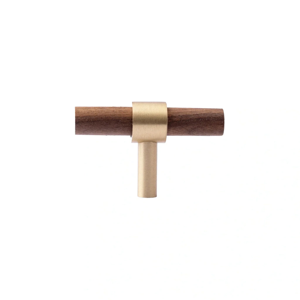 Brass Essence Walnut and brass T-bar handle from the collection, showing a close-up of the sleek, modern drawer handle design.