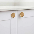 Brass essence Cherry Blossom Sunburst Brass Knob with intricate floral design, shiny brass finish, ideal for cabinet or drawer hardware.