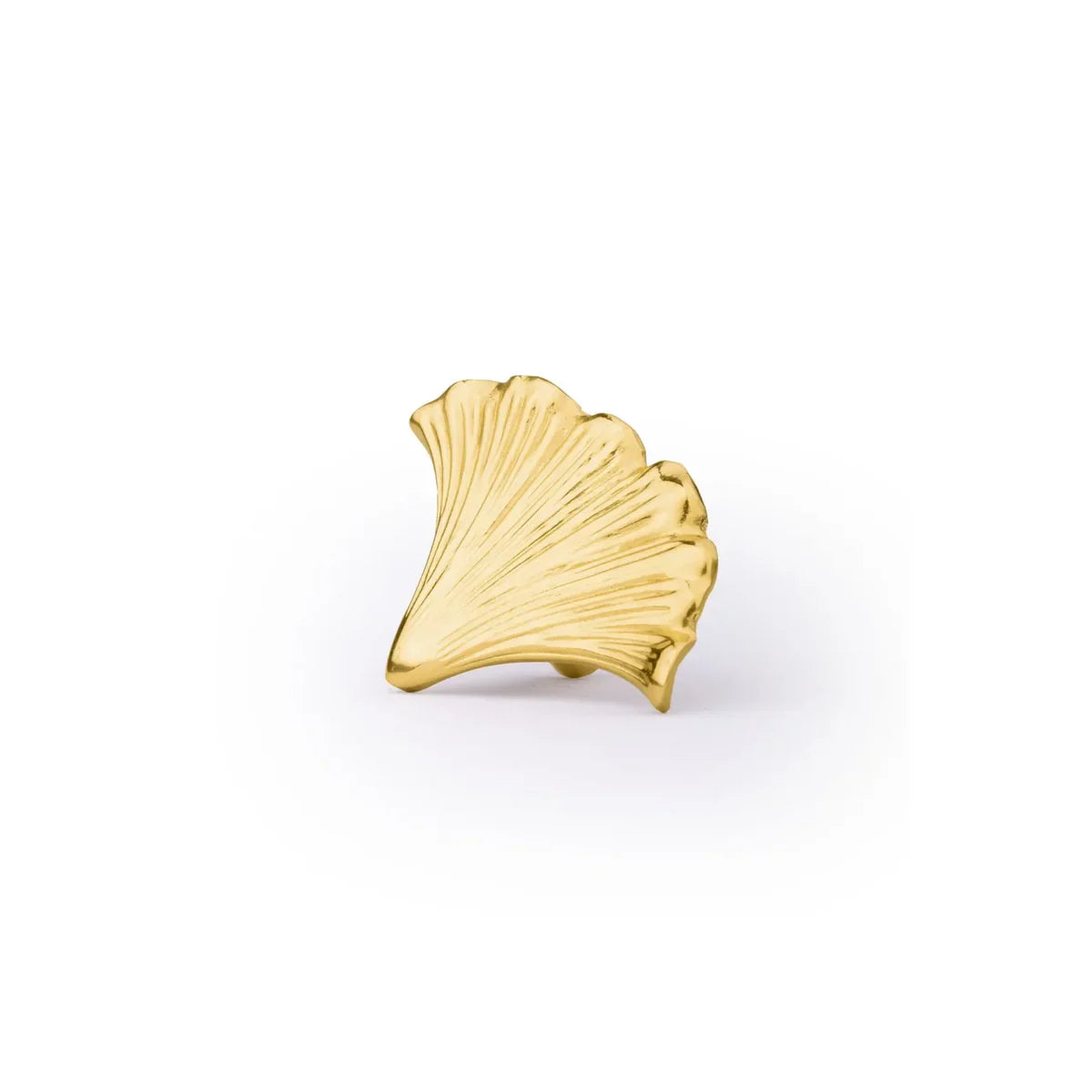 Gold shell-shaped object on a white background