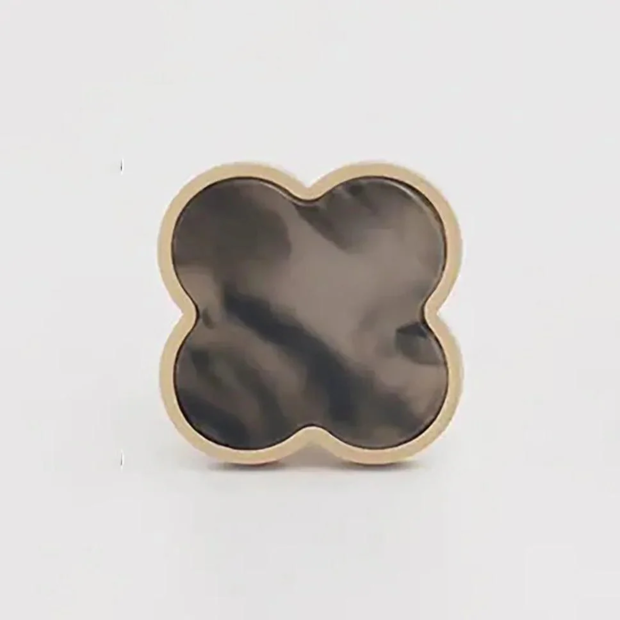 Brass essence Clover Brass Cabinet Knob from the Collection, showcasing a polished brass finish and elegant design for furniture.