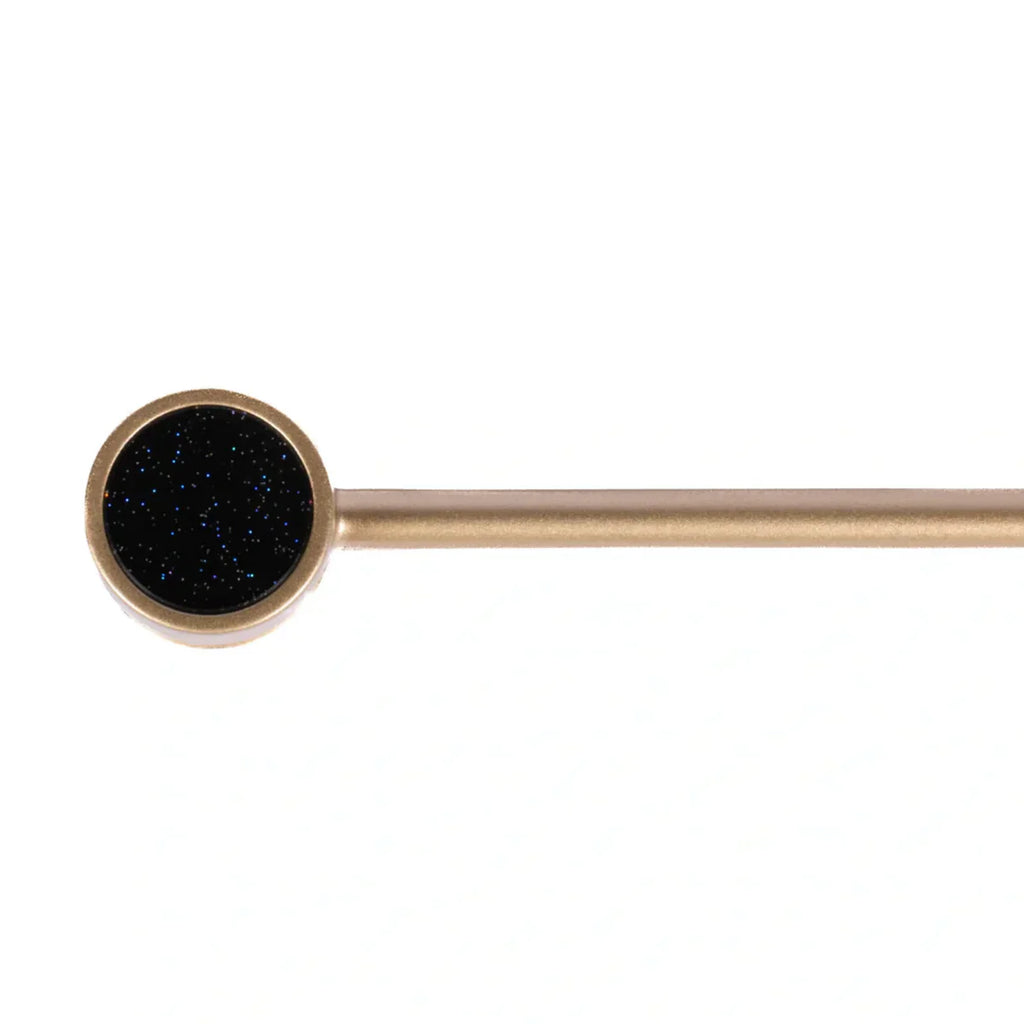 Brass Essence Bifocal Articulated Zinc Alloy Cabinet Pull with adjustable design and polished finish, mounted on a cabinet door.