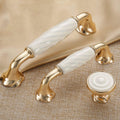 Brass Essence ridged ceramic and zinc cabinet pull with sleek design and textured surface for modern kitchen or furniture handles