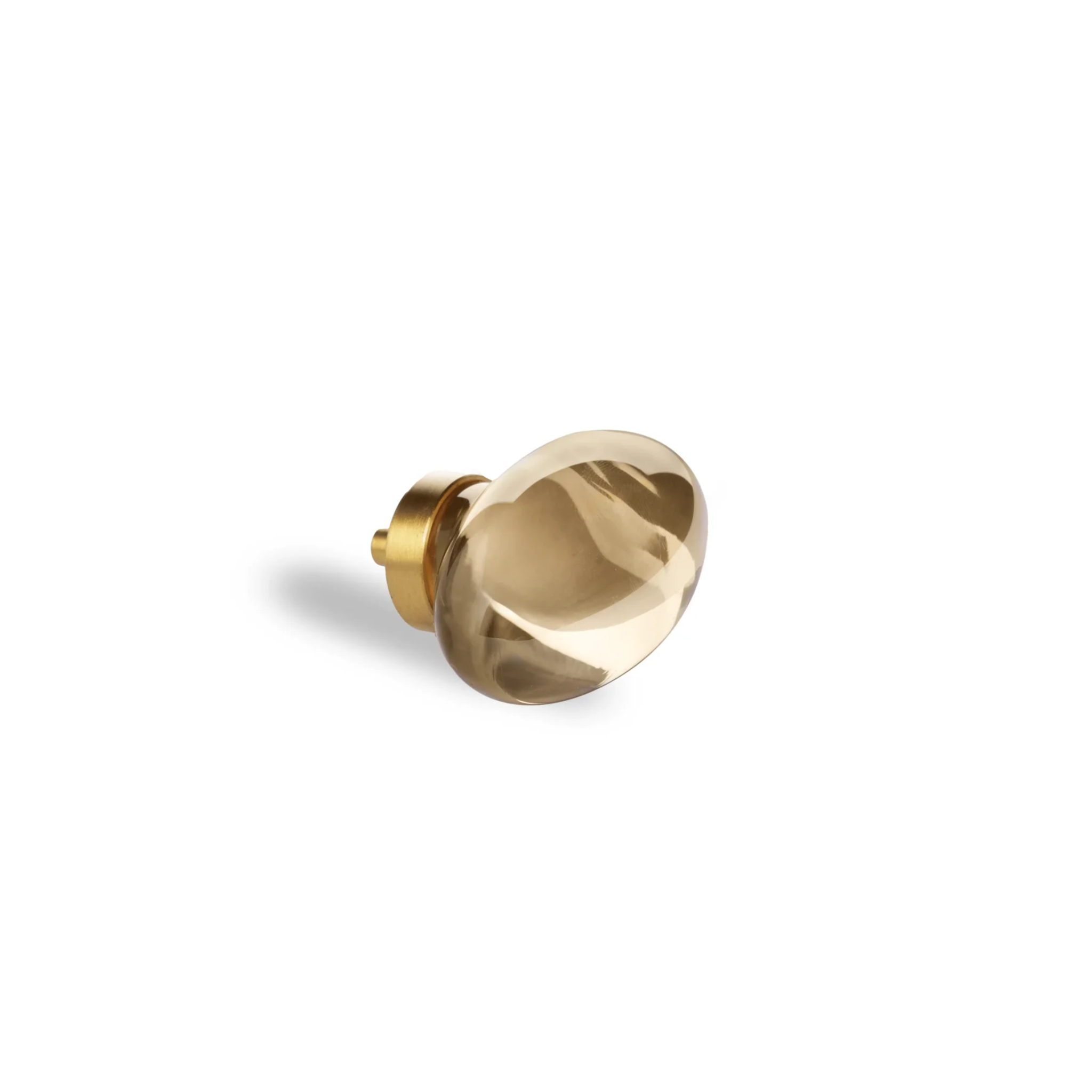 Classic crystal glass with brushed brass handle from Brass Essence, showing the detailed transparent glass and elegant brass handle.