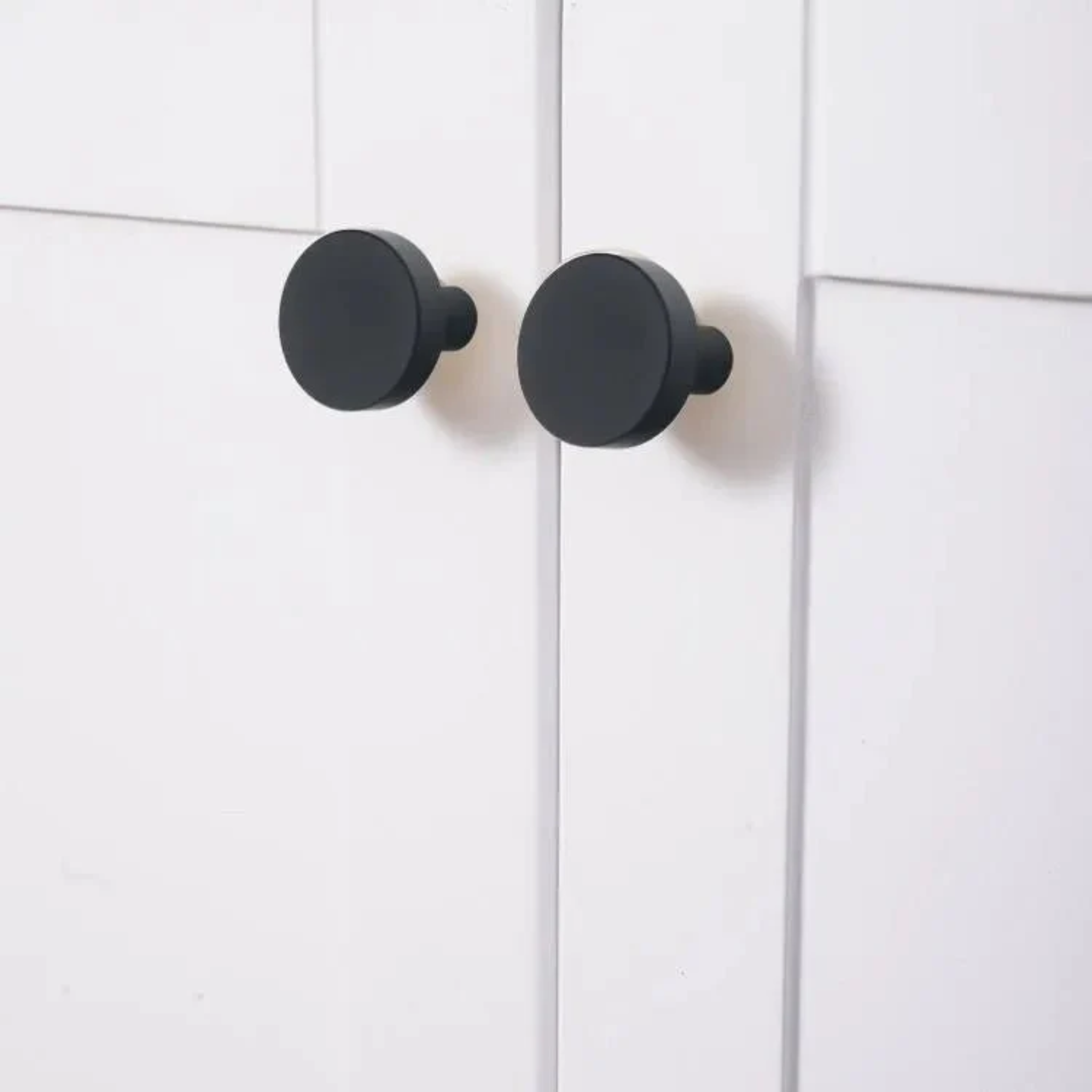 Brass essence Regal Solid Brass Knob B-0004 with minimal luxury design, polished brass finish, mounted on a wooden surface.