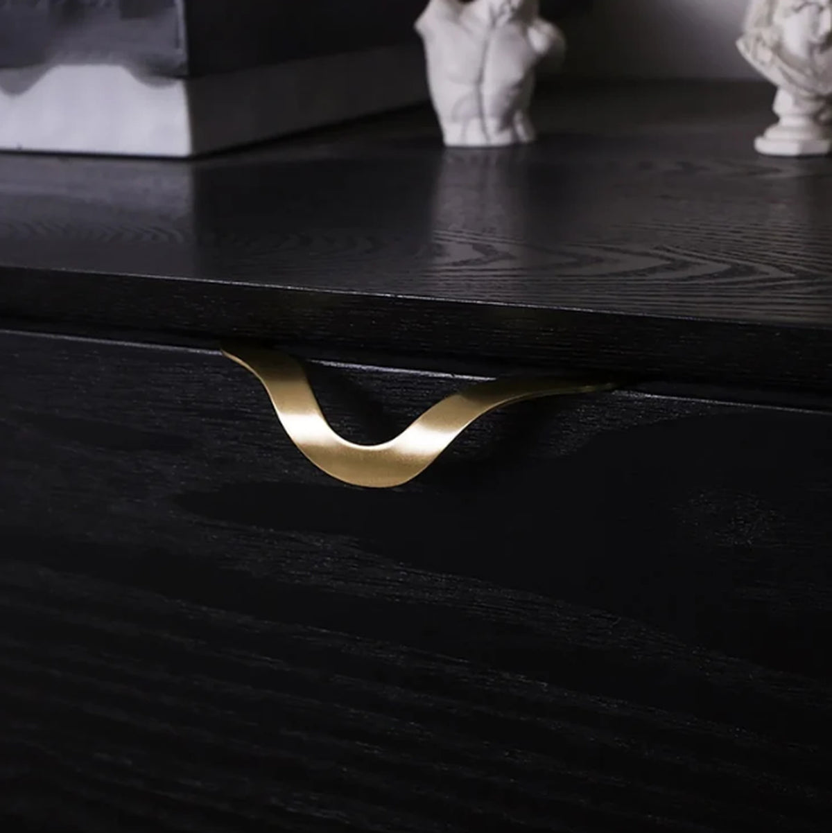 Brass Essence wave profile handles displayed on pastel blocks